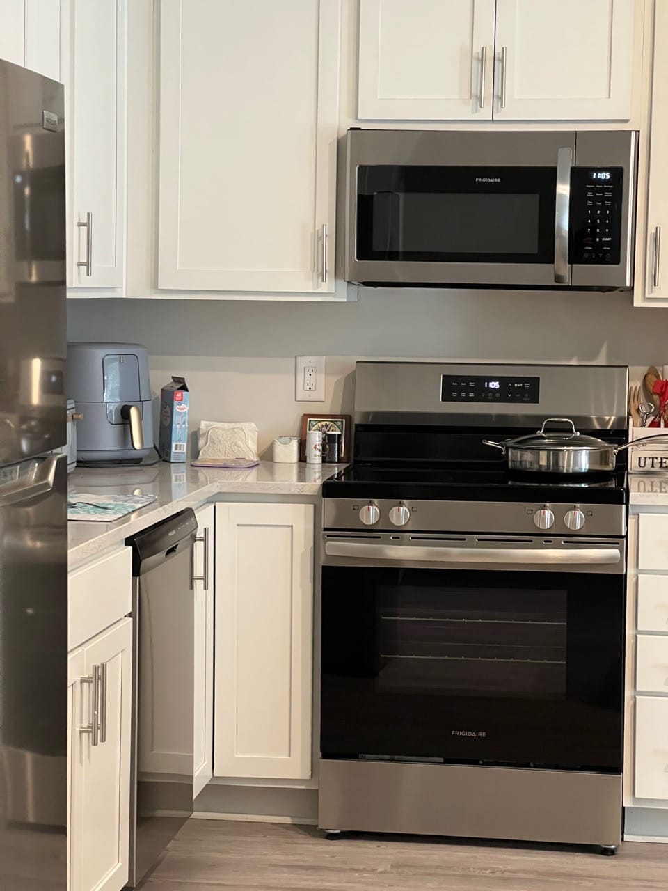 Routine kitchen cleaning in Fuquay-Varina NC with clean cabinets, appliances, and countertops by Bright Oak Home Services
